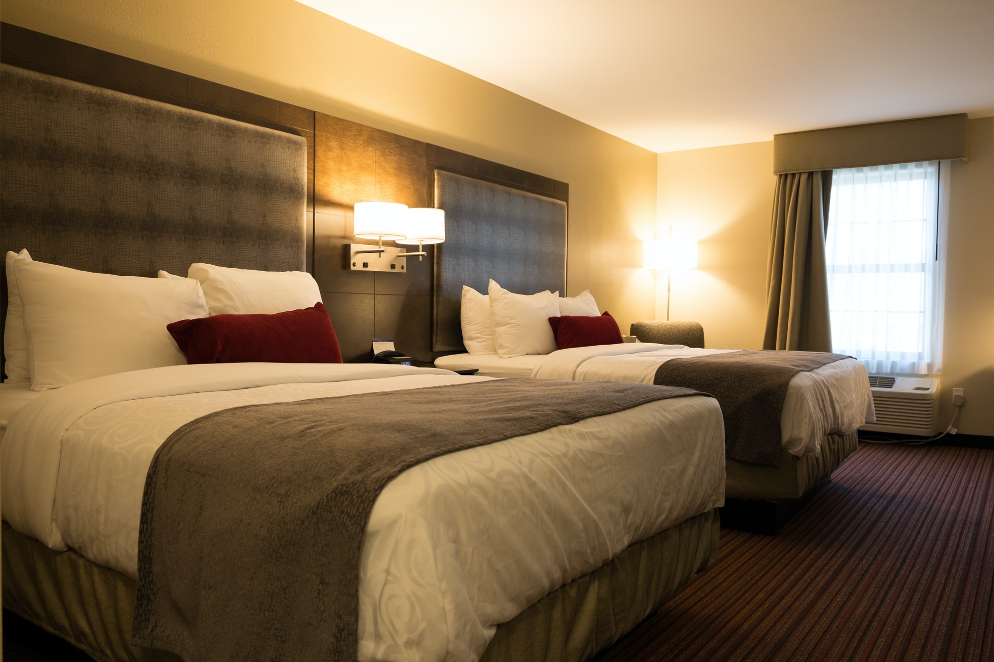 Interior of a twin queen bed hotel room